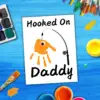 Searching for the perfect gift for Dad that will truly wow him? Introducing the handprint art project, “Hooked on Daddy!” This creative idea is guaranteed to bring a huge smile to his face! Simply print the template, grab some paint, and let those little hands create a unique masterpiece!