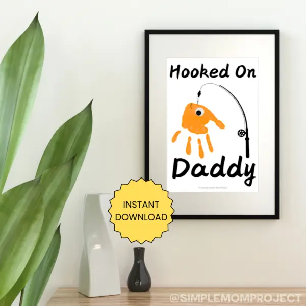 Searching for the perfect gift for Dad that will truly wow him? Introducing the handprint art project, “Hooked on Daddy!” This creative idea is guaranteed to bring a huge smile to his face! Simply print the template, grab some paint, and let those little hands create a unique masterpiece!